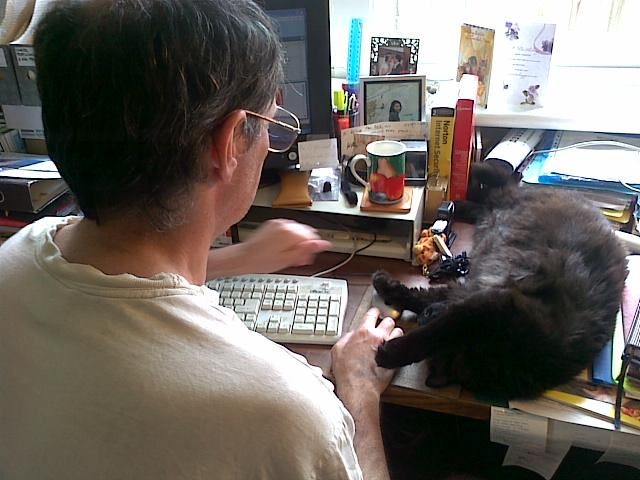 Peter working at computer, 'assisted' by Shadow_05-02-2012.jpg