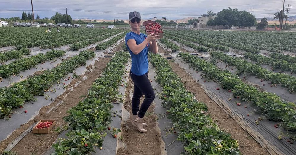 Life on Babushka's farm instilled an early love of growing  her own food and  sharing with others. Iryna still enjoys harvesting from the fields and  gardening. Here, she's picking strawberries.