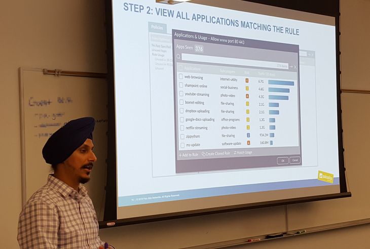 Mandeep Singh Sandhu from Palo Alto Networks presenting PAN-OS 9.0 features to a group of attendees at the Fuel User Group meeting.