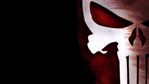 4546374-the-punisher-logo-skull-black-background-marvel-comics.jpg