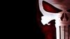 4546374-the-punisher-logo-skull-black-background-marvel-comics.jpg