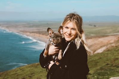 Jenna with her French bulldog, Moose, during a weekend trip to the beach